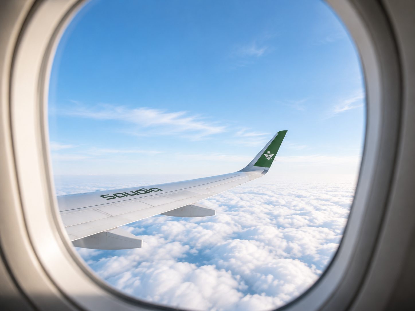 À bord d'un vol Saudia Airlines — vue depuis le hublot vers les Lieux Saints